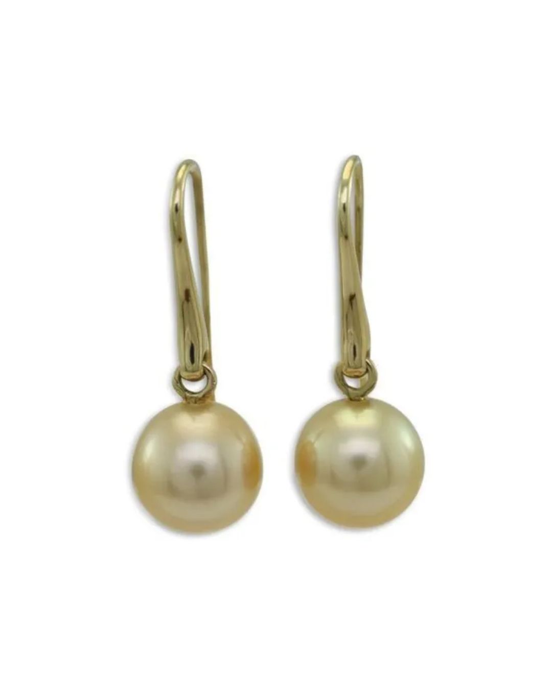 A pair of gold earrings featuring smooth, round golden pearls suspended from simple gold curved hooks.
