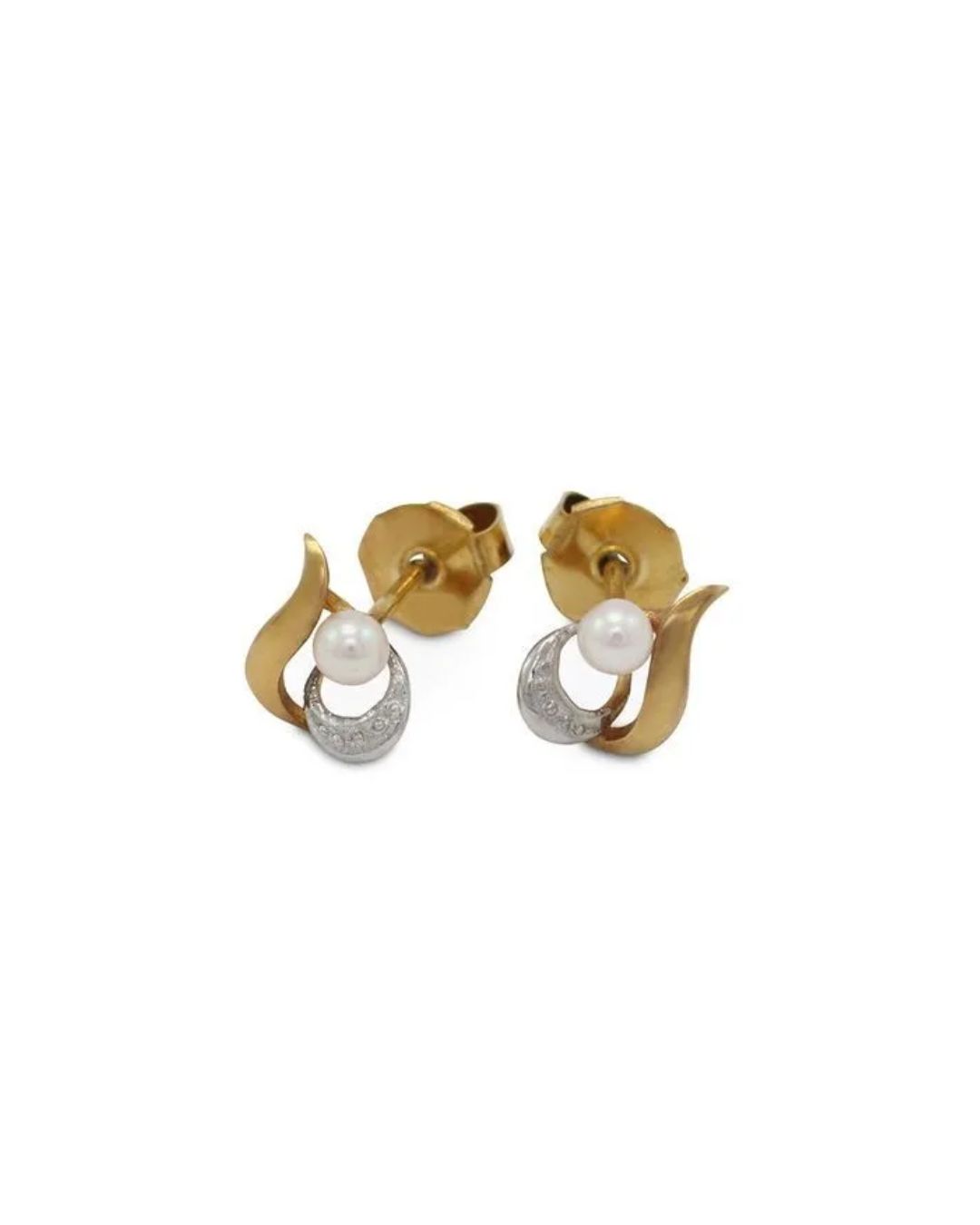 A pair of earrings featuring a small white pearl cradled by a curved gold-tone element and a silver-tone pavé accent.