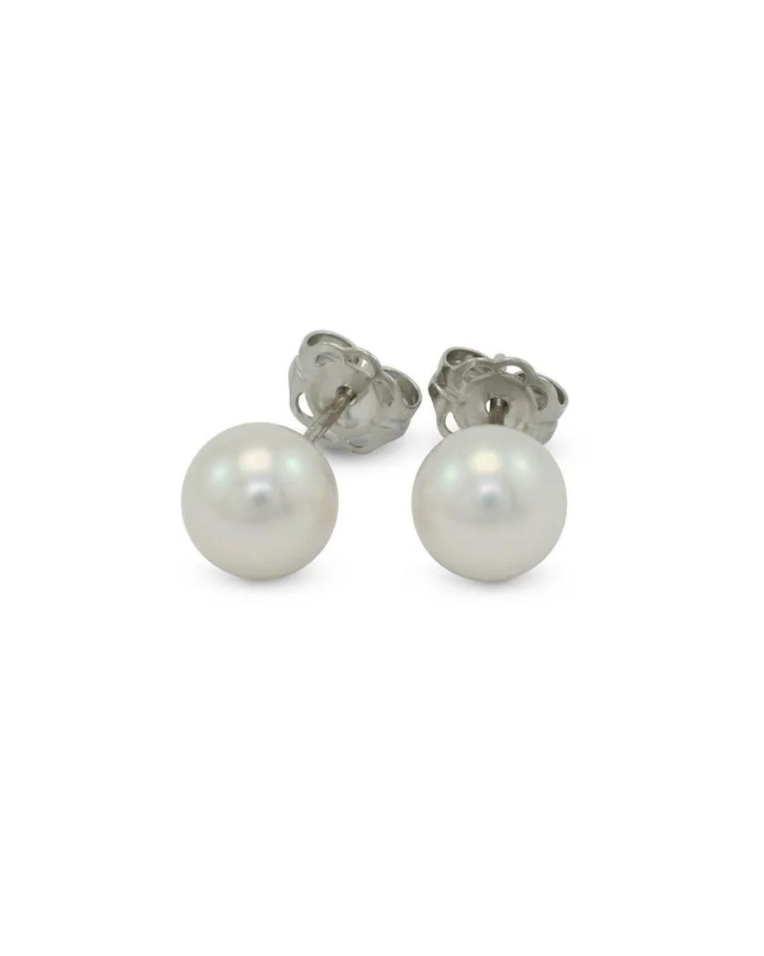 A pair of white pearl stud earrings with silver-toned posts, isolated on a white background.