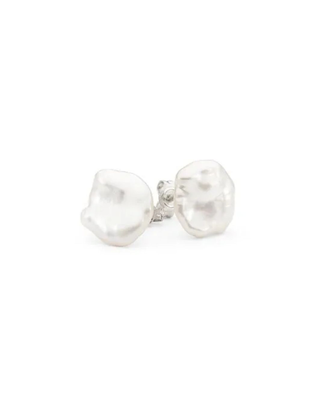 A pair of iridescent, organic-shaped baroque pearl stud earrings on a white background.