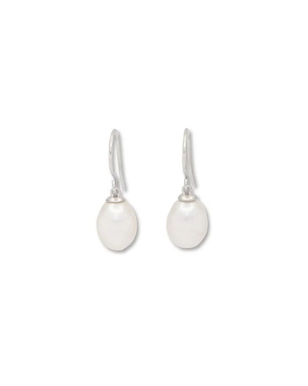 A pair of simple silver drop earrings featuring oval-shaped, lustrous white pearls on curved wire hooks.