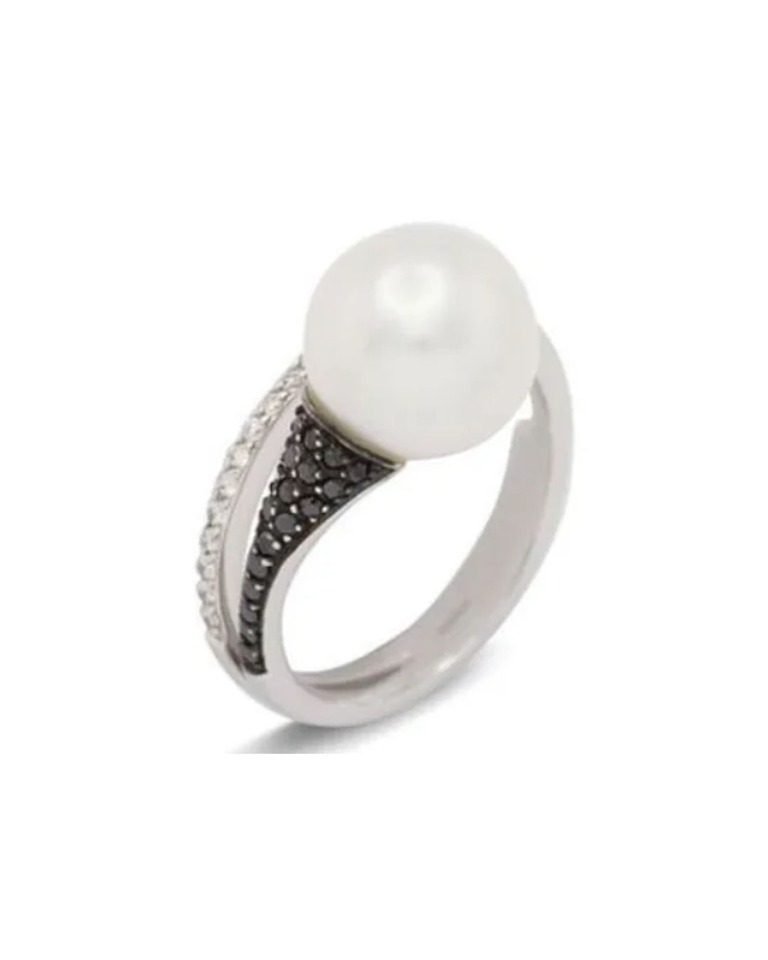 A white pearl ring on a silver band featuring a pavé setting of black and clear accent stones.