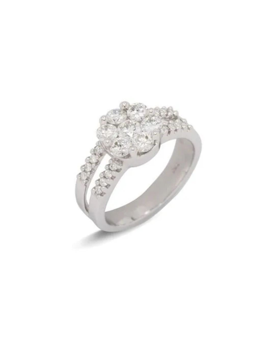 A silver ring with a cluster of round-cut diamonds at the center and pave diamonds along the split-shank band.