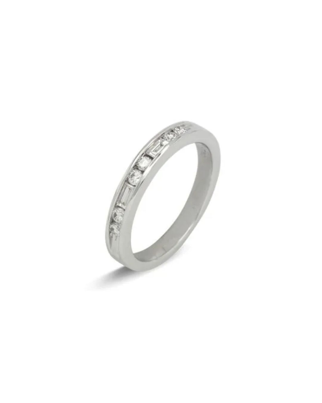 A silver band ring set with an alternating pattern of round and baguette-cut diamonds in a channel setting.