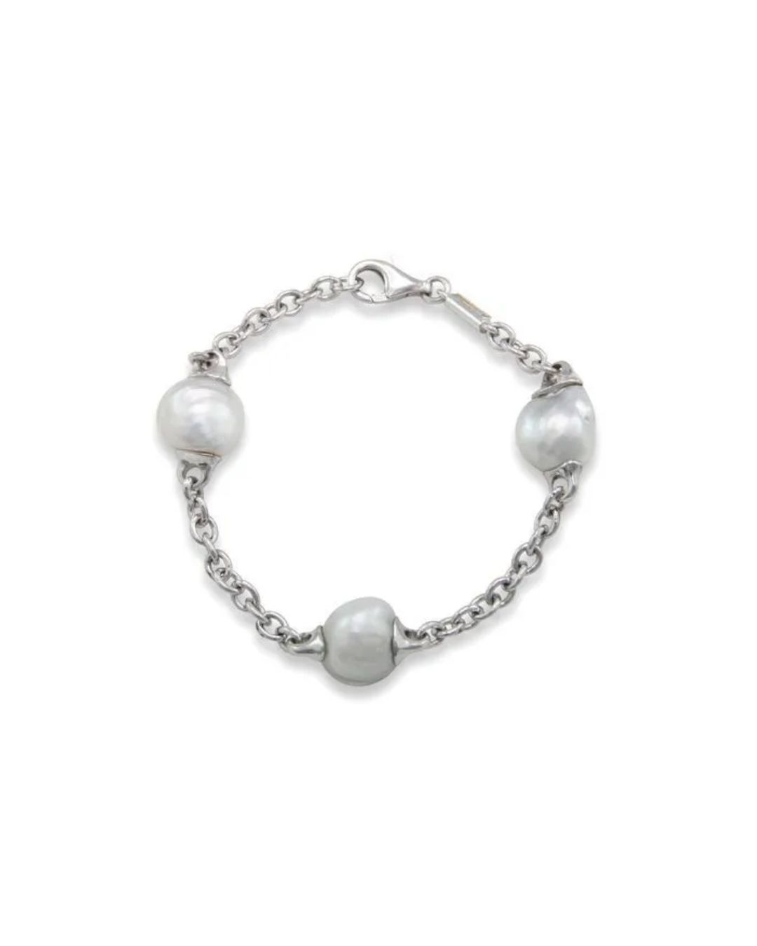 A silver bracelet featuring three irregular white pearls set along a silver link chain with a lobster clasp closure.