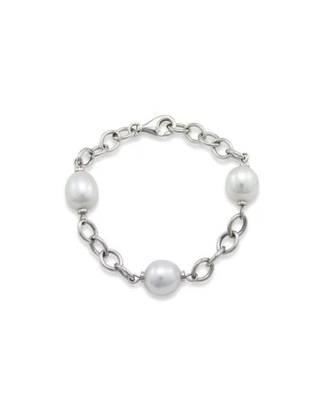 A silver chain link bracelet featuring three round white pearls set at intervals against a plain white background.