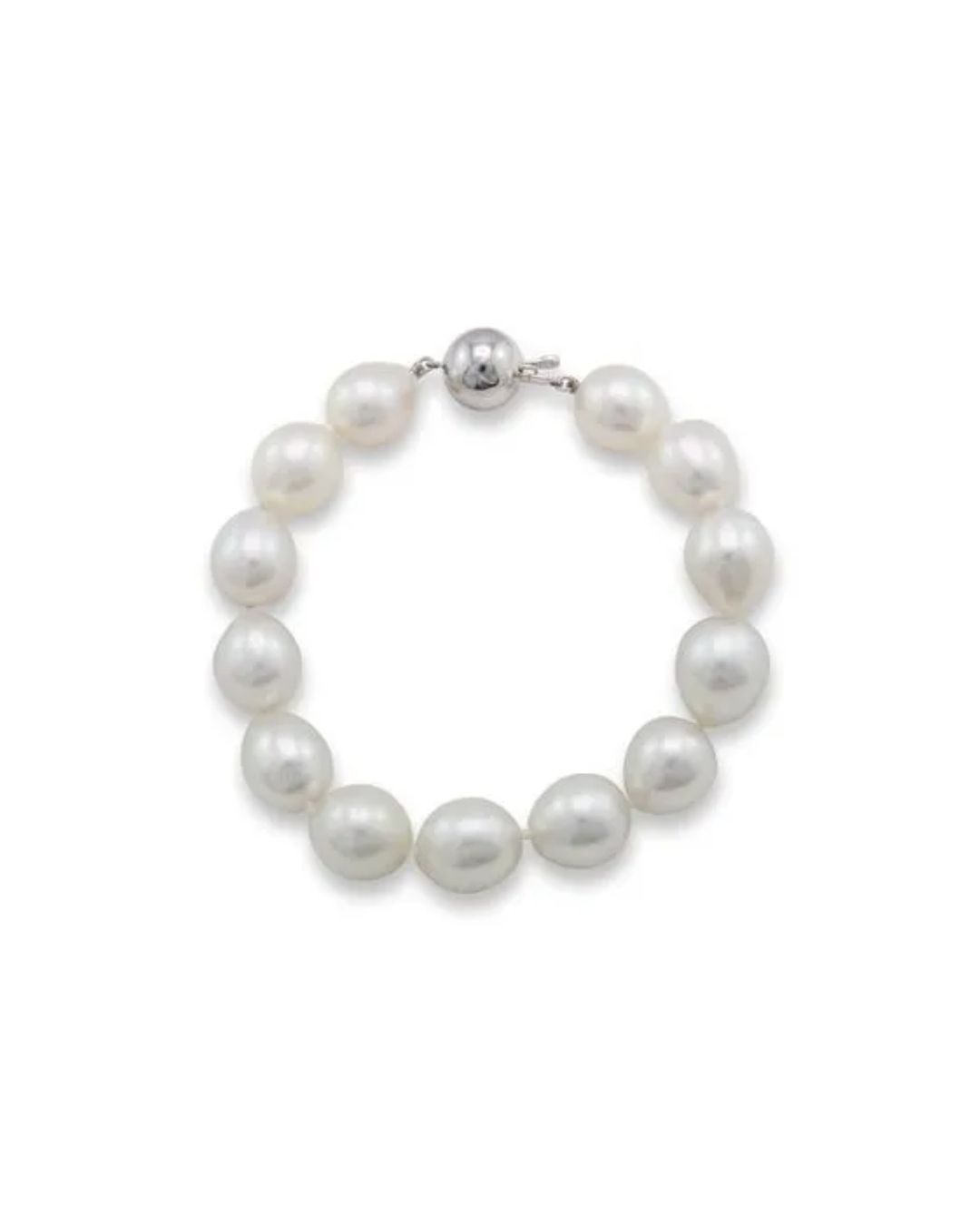 A bracelet made of large, cream-colored, oval pearls with a round, polished silver clasp, set against a white background.
