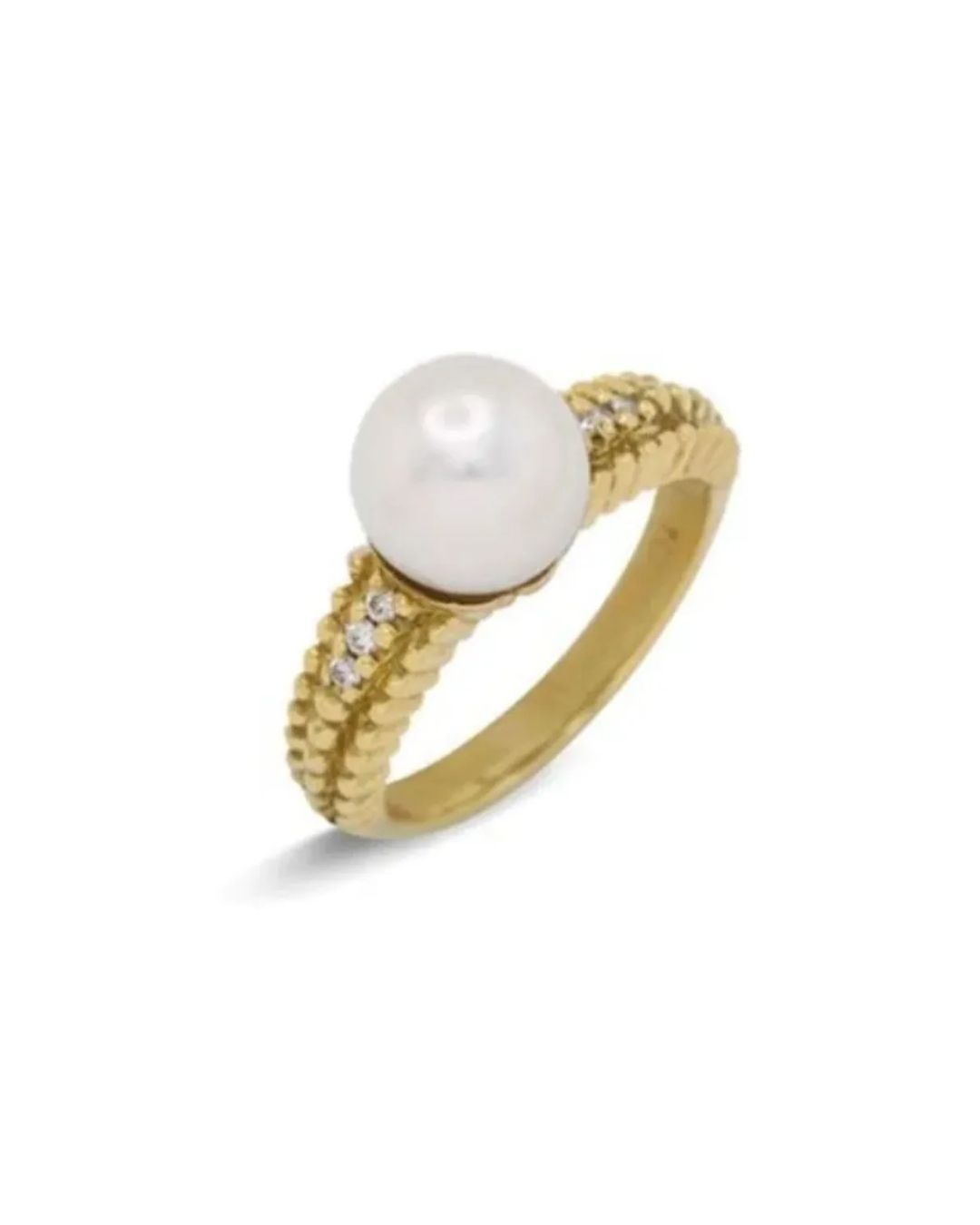 A gold ring featuring a centered white pearl set between bands adorned with small diamonds on a white background.
