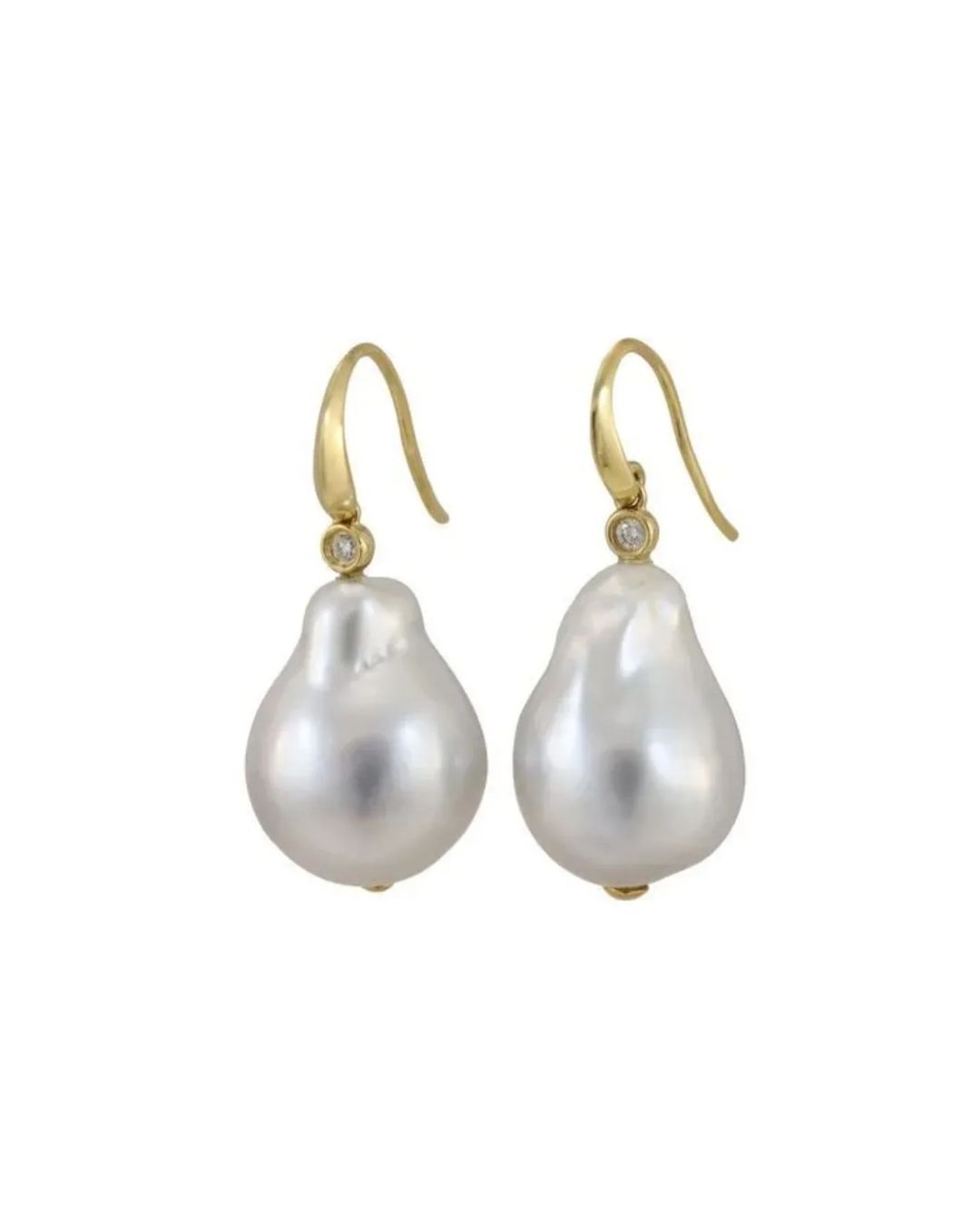 A pair of teardrop-shaped baroque pearl earrings with gold hooks and a small diamond accent on each.