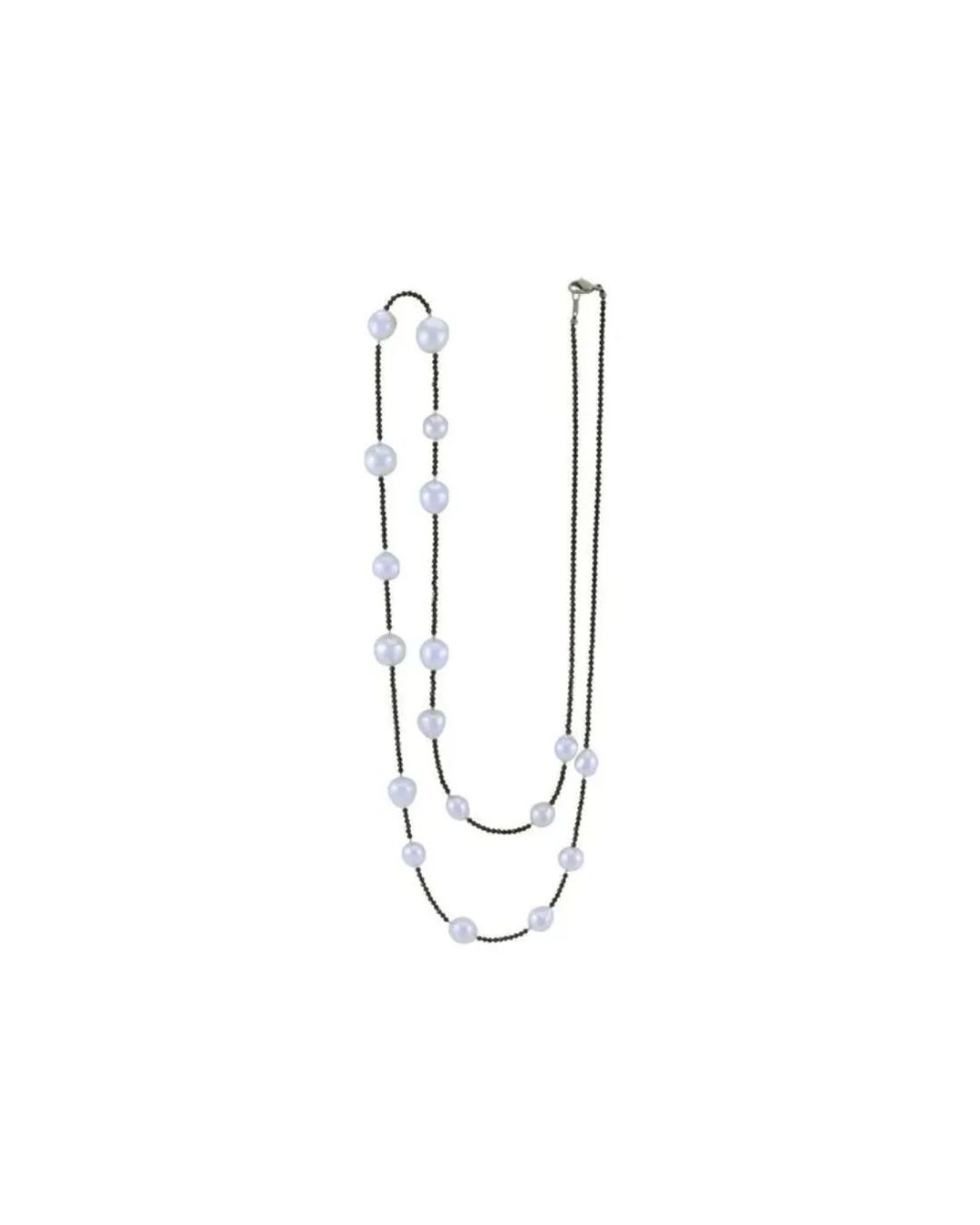 A long necklace featuring a thin, dark chain adorned with spaced-out, round, light-colored pearls or beads.