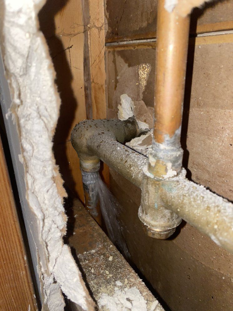 A close up of a pipe in a wall