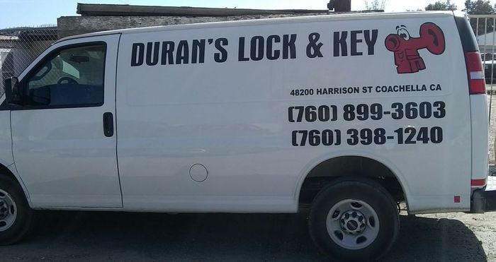 A white van with duran 's lock and key written on it