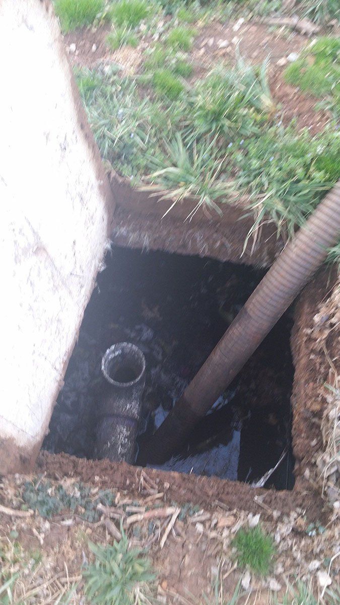 Side View of Septic Tank Cleaning — Appomattox, VA — Taylor’s Septic Service Inc