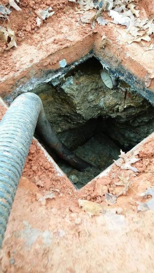 Close Up View of Ongoing Septic Tank Cleaning — Appomattox, VA — Taylor’s Septic Service Inc