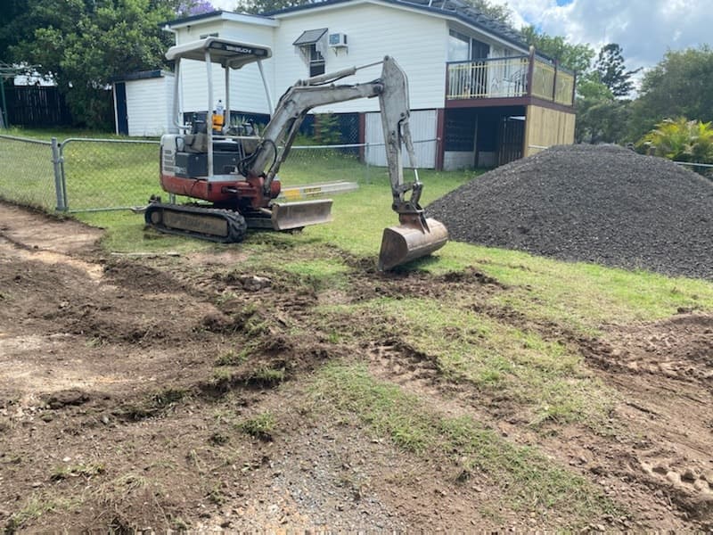 Clearing the Bushes Around the Residential Property — MDK Mini Excavator - Dingo & Tipper Hire in Gympie, QLD