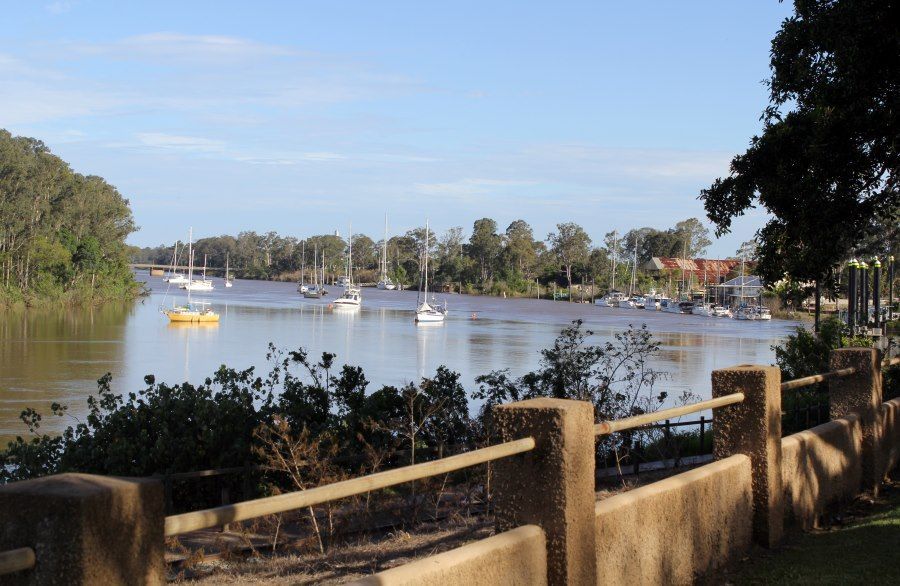 A River With Boats in It — MDK Mini Excavator - Dingo & Tipper Hire in Maryborough, QLD