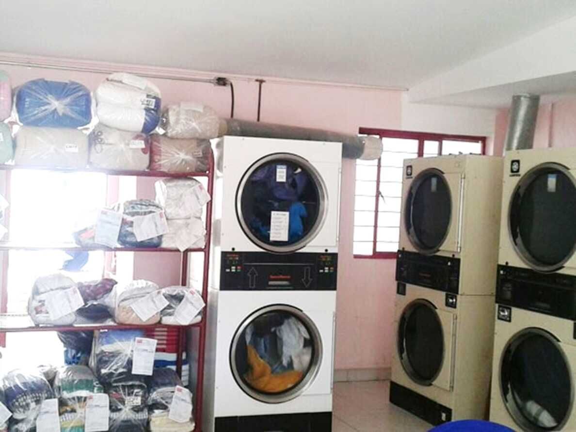 MAGIC WASH - servicio de lavandería y tintorería.