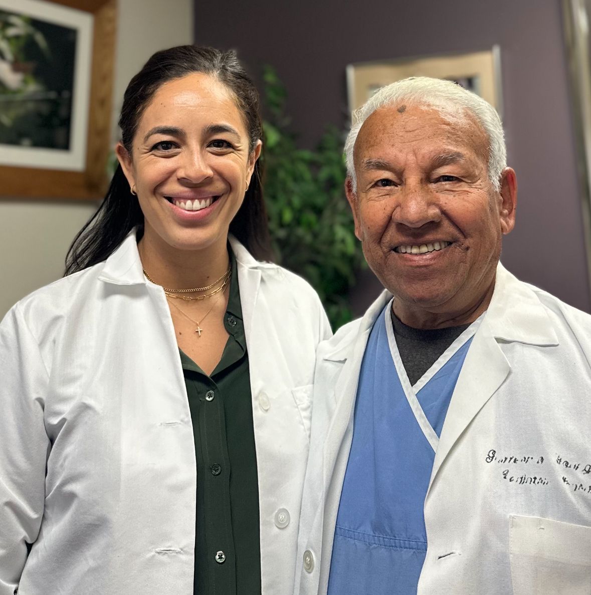 Two medical doctors in a medical office.