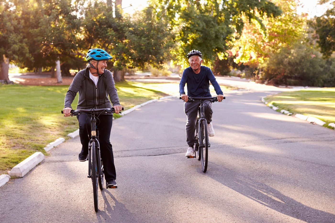 Senior Couple Riding Bicycle – St. Augustine, FL – Pain Management Specialists