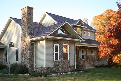 Man Hand Nailing Roof