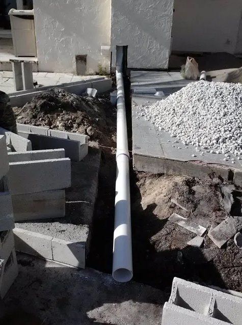 White Pipe On Commercial Building — Oakland Park, FL — Watertite Gutter Company