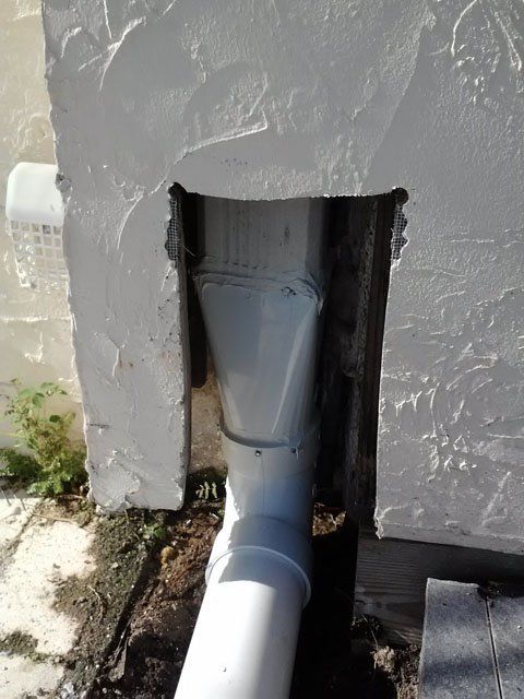 Pipe On Commercial Building — Oakland Park, FL — Watertite Gutter Company