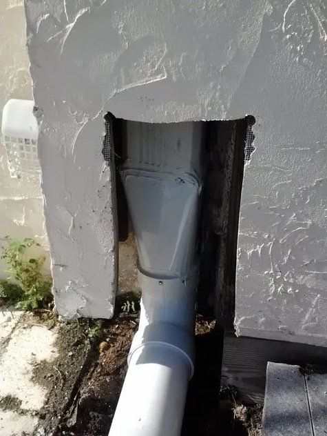 Pipe On Commercial Building — Oakland Park, FL — Watertite Gutter Company