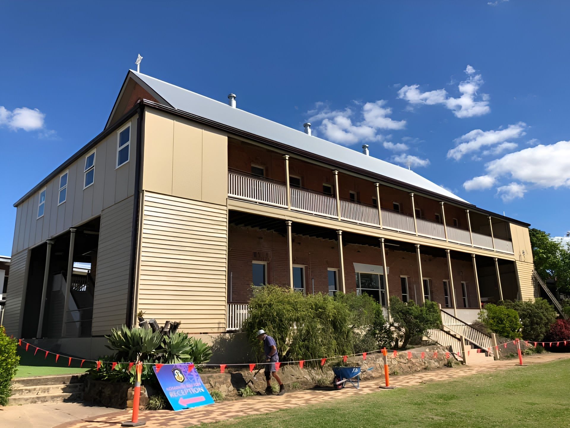 Two-story Beige and Brown Building With Balcony — Allman's Painting in Sunshine Coast, QLD