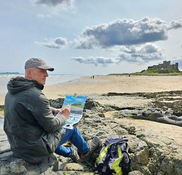 North East Artist Paul Armstrong painting Bamburgh Castle