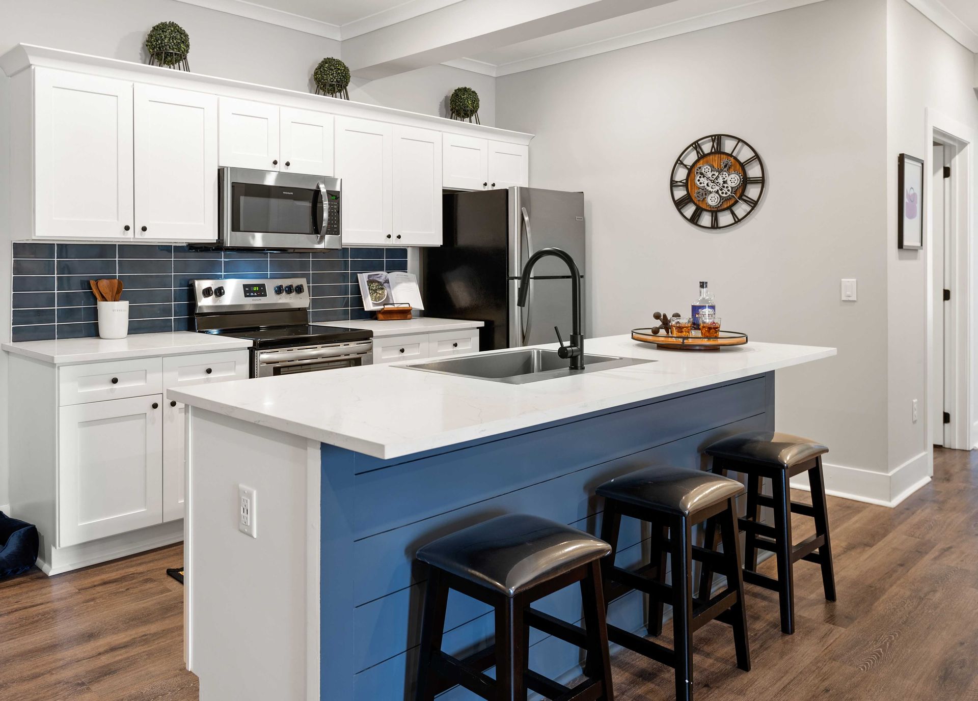 Kitchen with Breakfast Bar at Pointe Grand Byron.