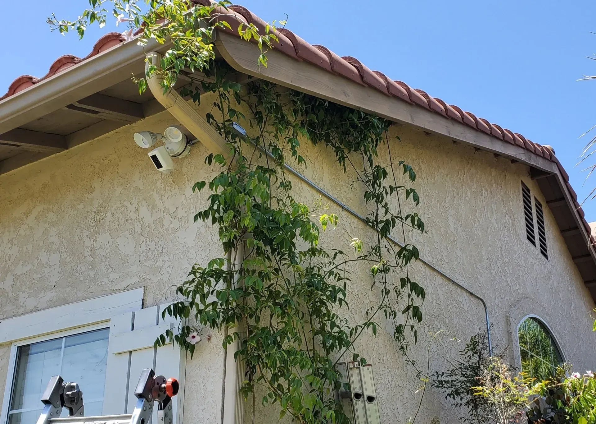 A house with a camera on the side of it