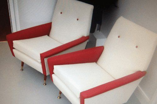 View of red and white upholstery for sofa chair