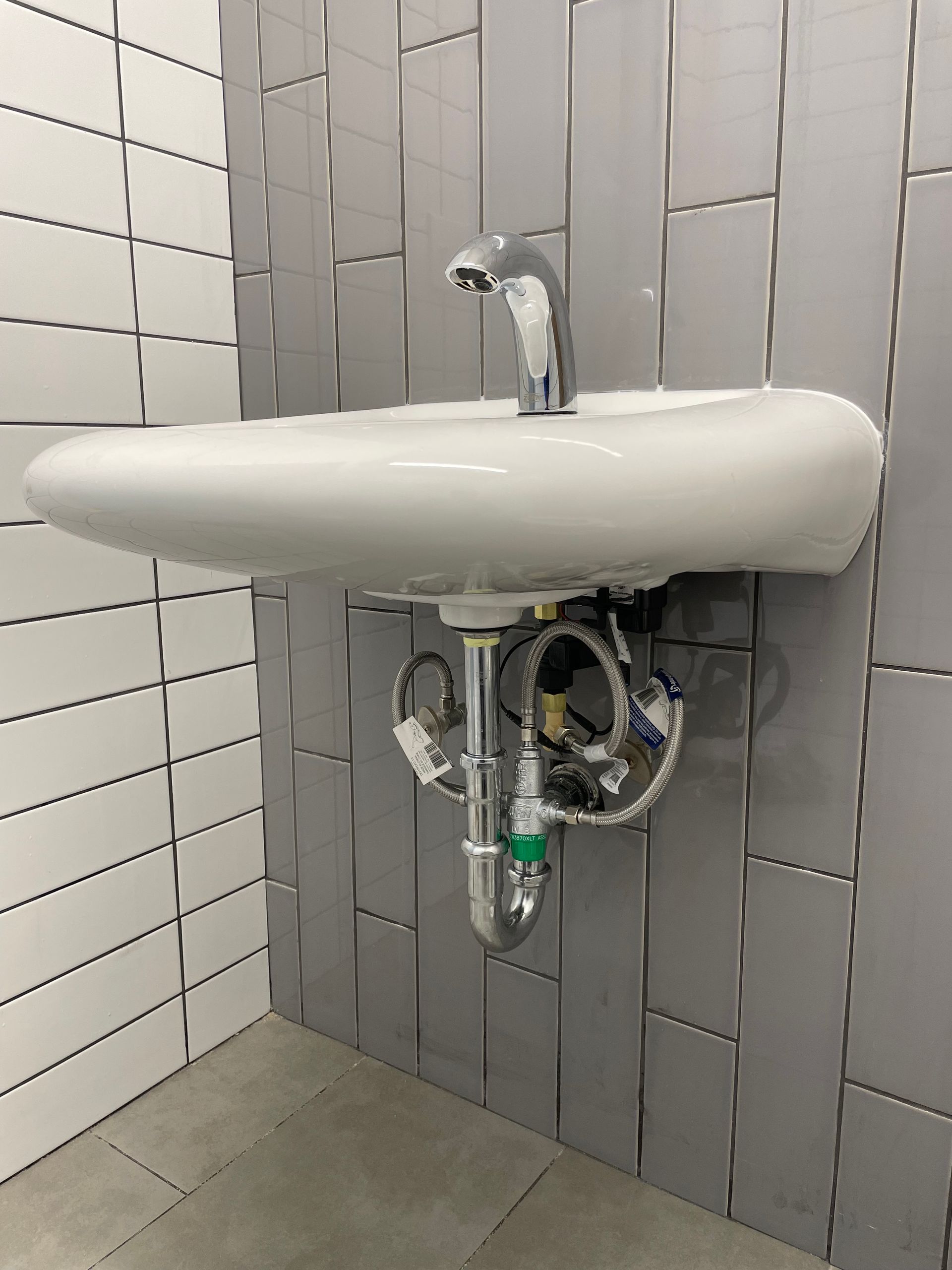 A bathroom sink with a faucet attached to it