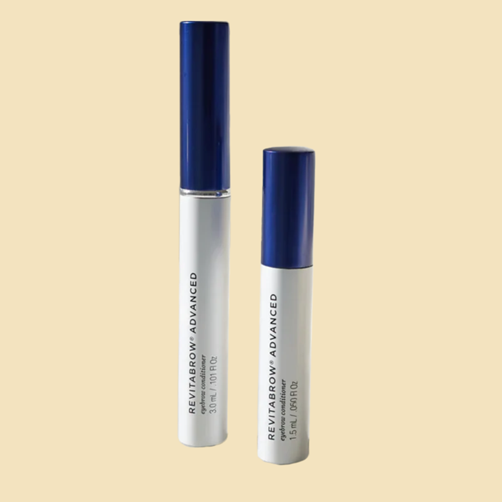 Two tubes of revitabrow advanced mascara on a yellow background