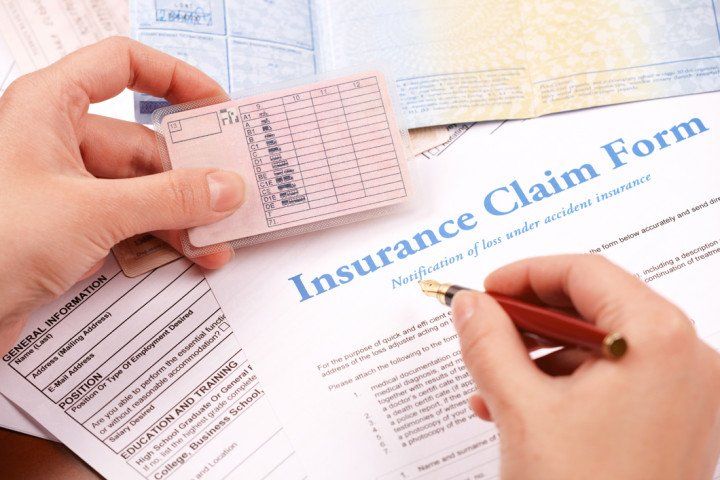 checking an insurance claim form