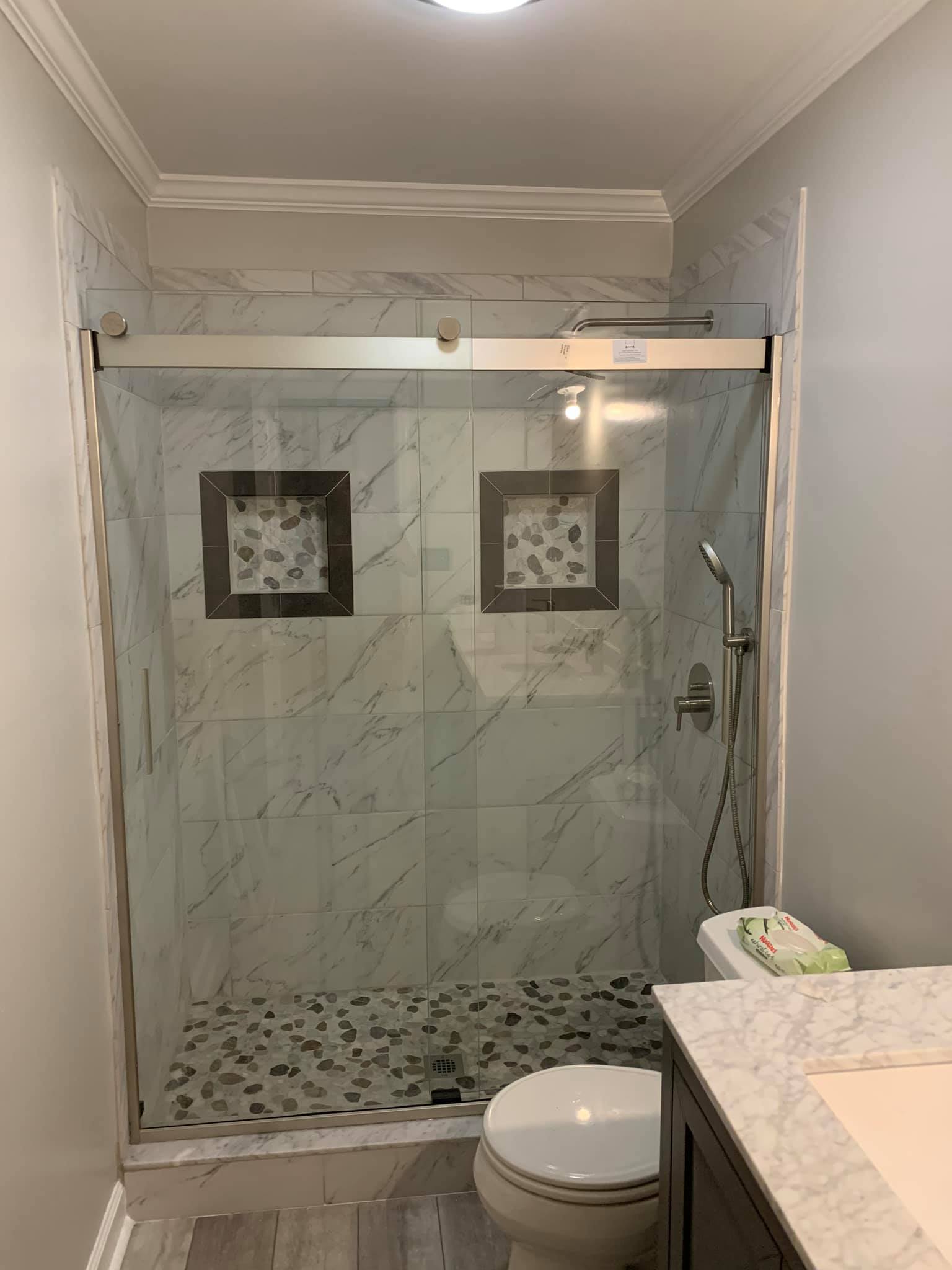 Bathroom Shower Tiles With Mirror Walls — Winston-Salem, NC — Foust Flooring