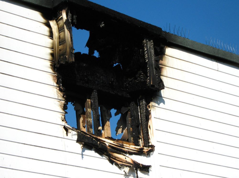A siding that has been damaged by fire