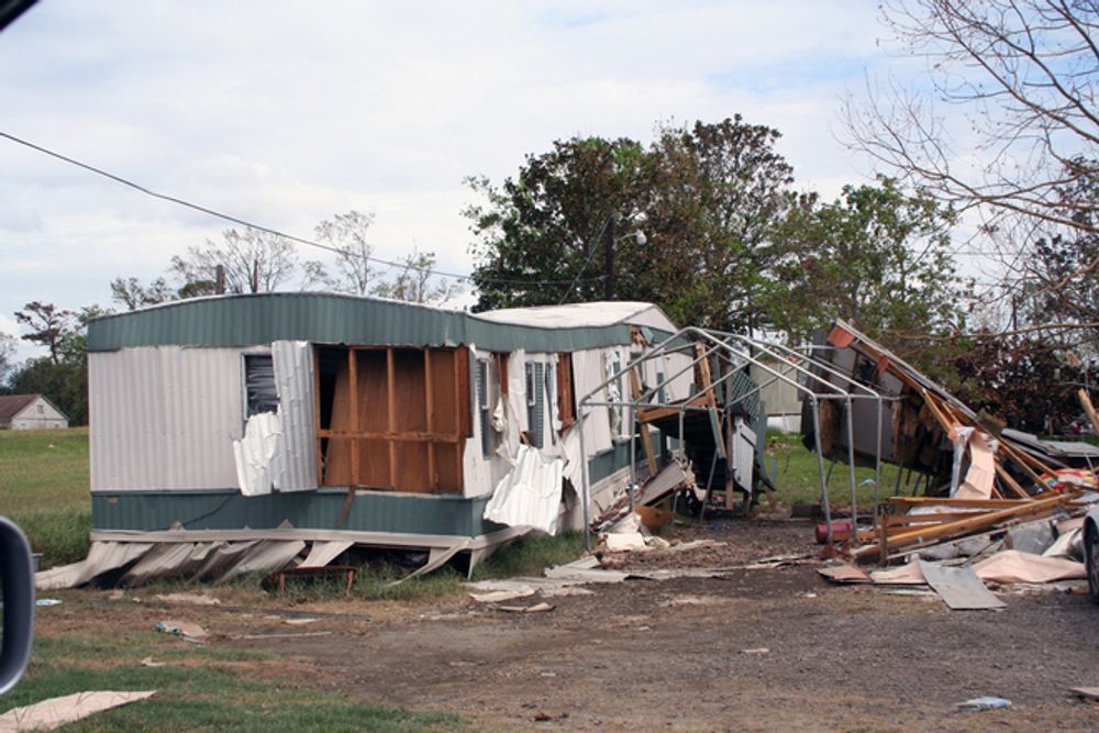 A mobile home that has been damaged by a tornado