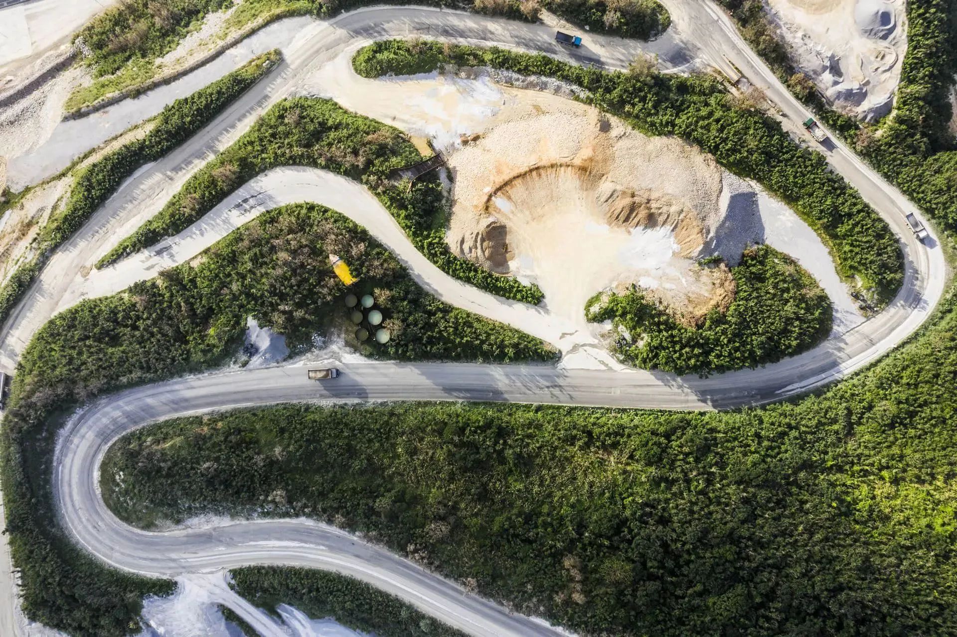 View of winding road surrounded by greenery