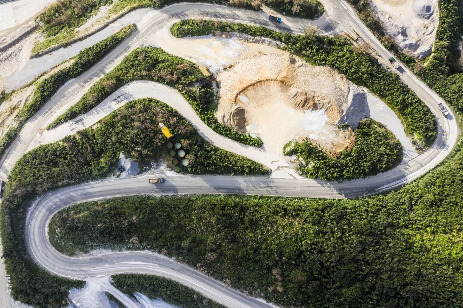 View of winding road surrounded by greenery