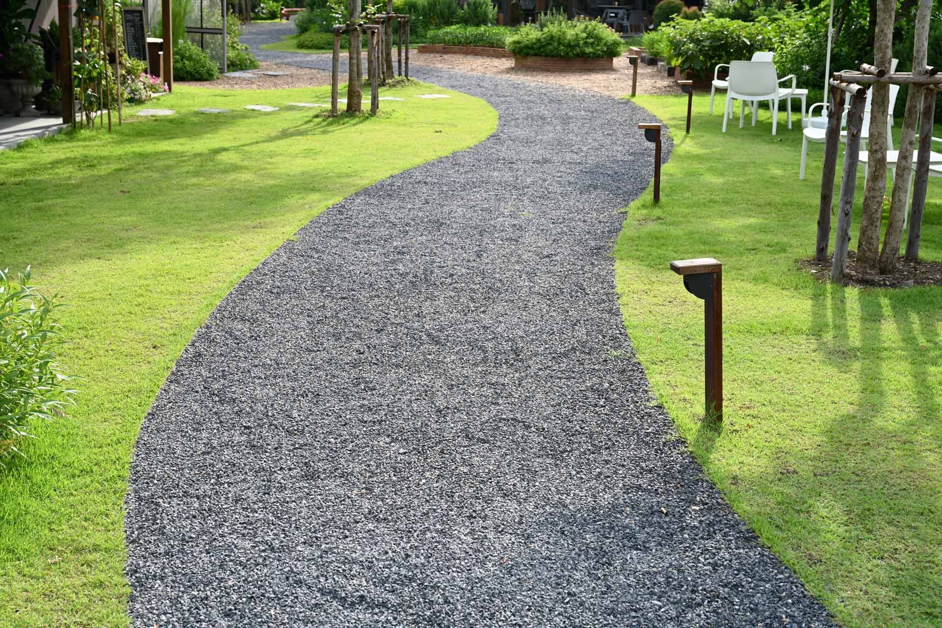 Stone path through a grassy yard