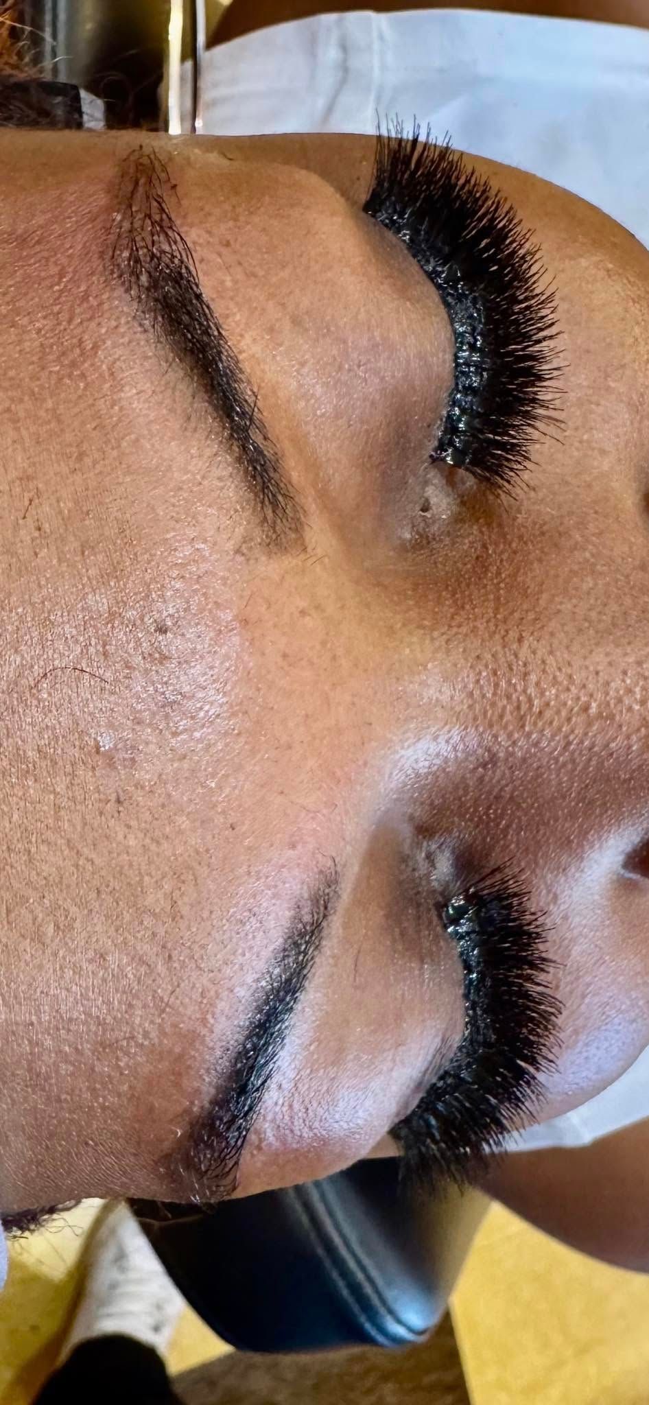 Close-up of a person's face with freshly laminated eyebrows.