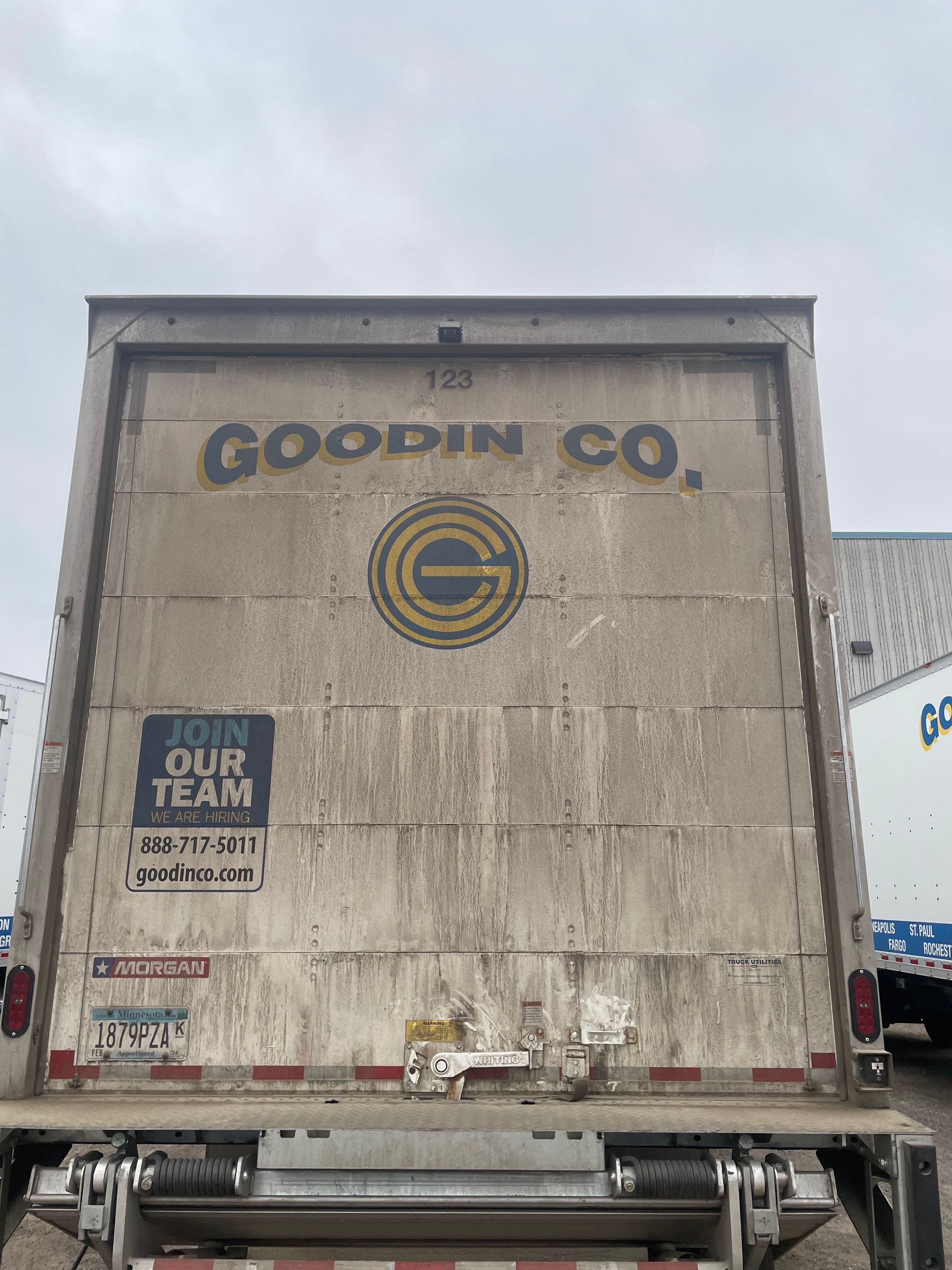 Back of a truck covered with dirt