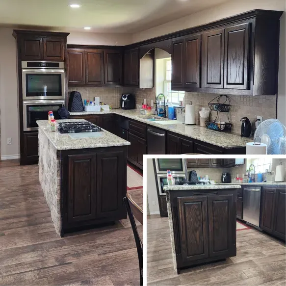 Dark wood kitchen with granite countertops, island with stovetop, stainless steel appliances, and wood floor.