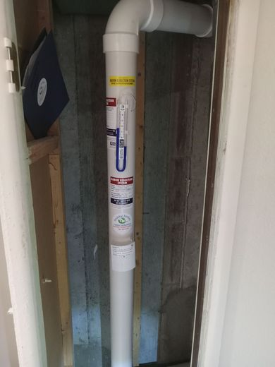 A white pipe with the letter b on it