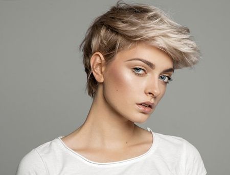 Woman with Styled Blonde Hair — Trendy Hairdresser in Cairns, QLD