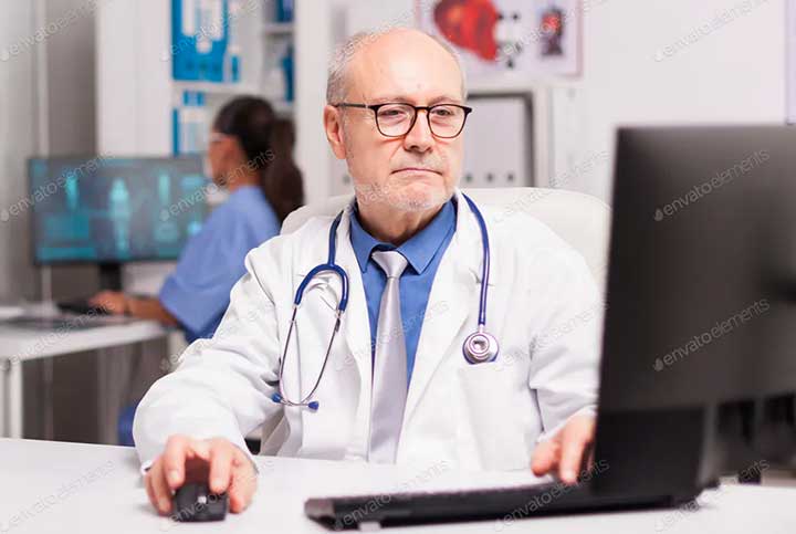 NHS Doctor at Desk