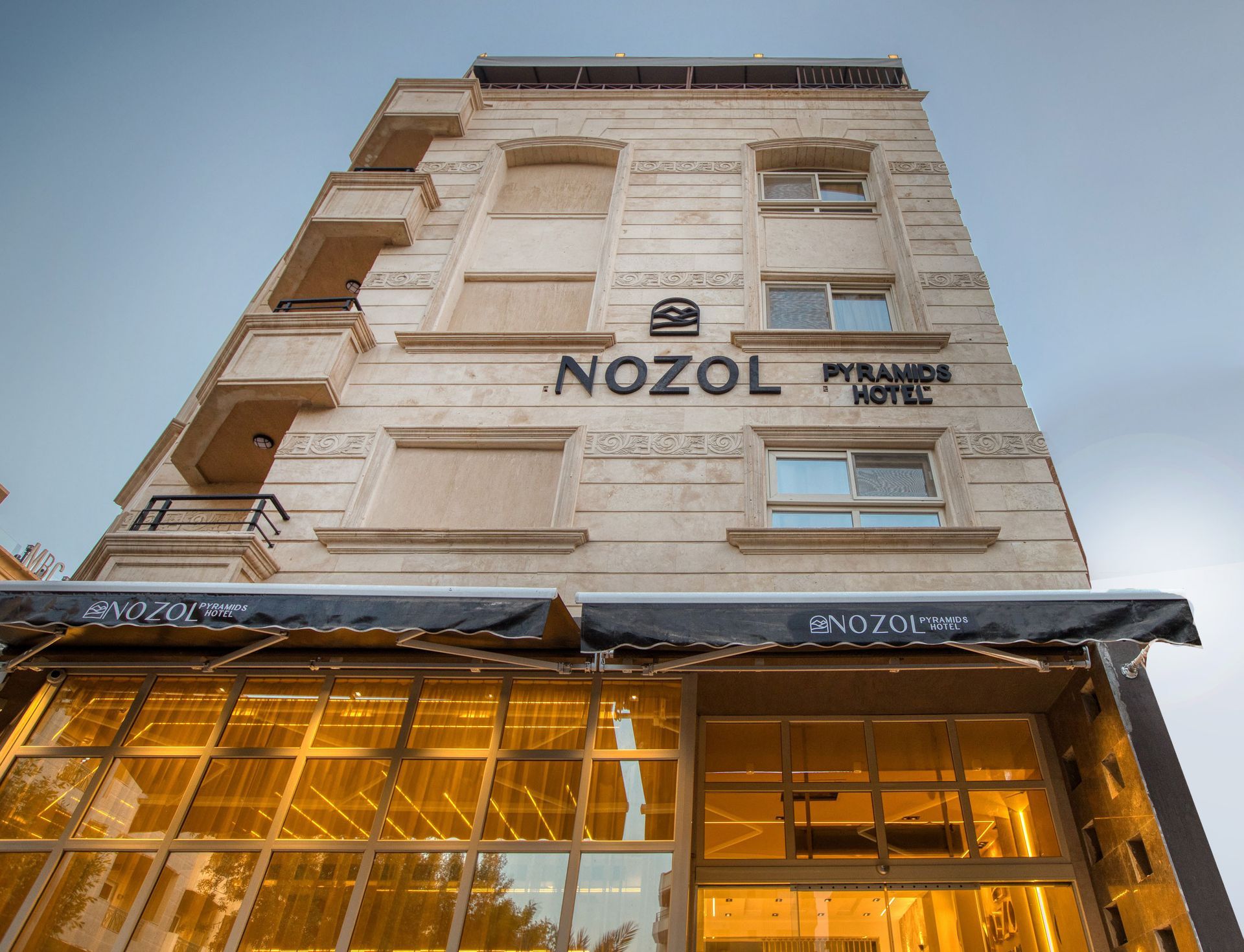 A large building with the word nozol on it