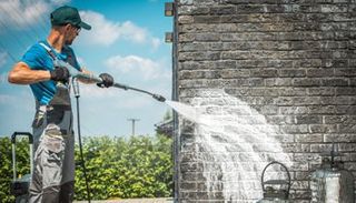 Power Washing the Wall — Kansas City, KS — The Kansas Paint Company