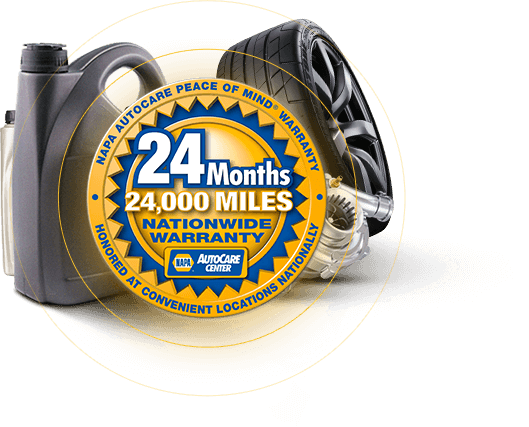 Blue and gold warranty badge on a vacuum cleaner, showing 24 months or 24,000 miles nationwide warranty. | 106 St Tire and Wheel